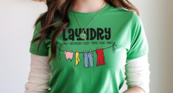 Blog image for washing tips page... a green tshirt with humorous text, "Laundry, ain't nobody got time for that" and an illustration of a clothes line with laundry hanging on it.